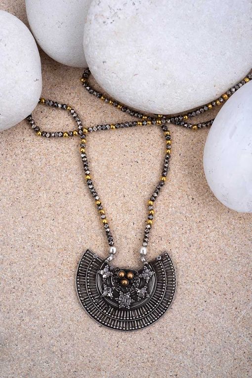 jewellry displayed on rocks